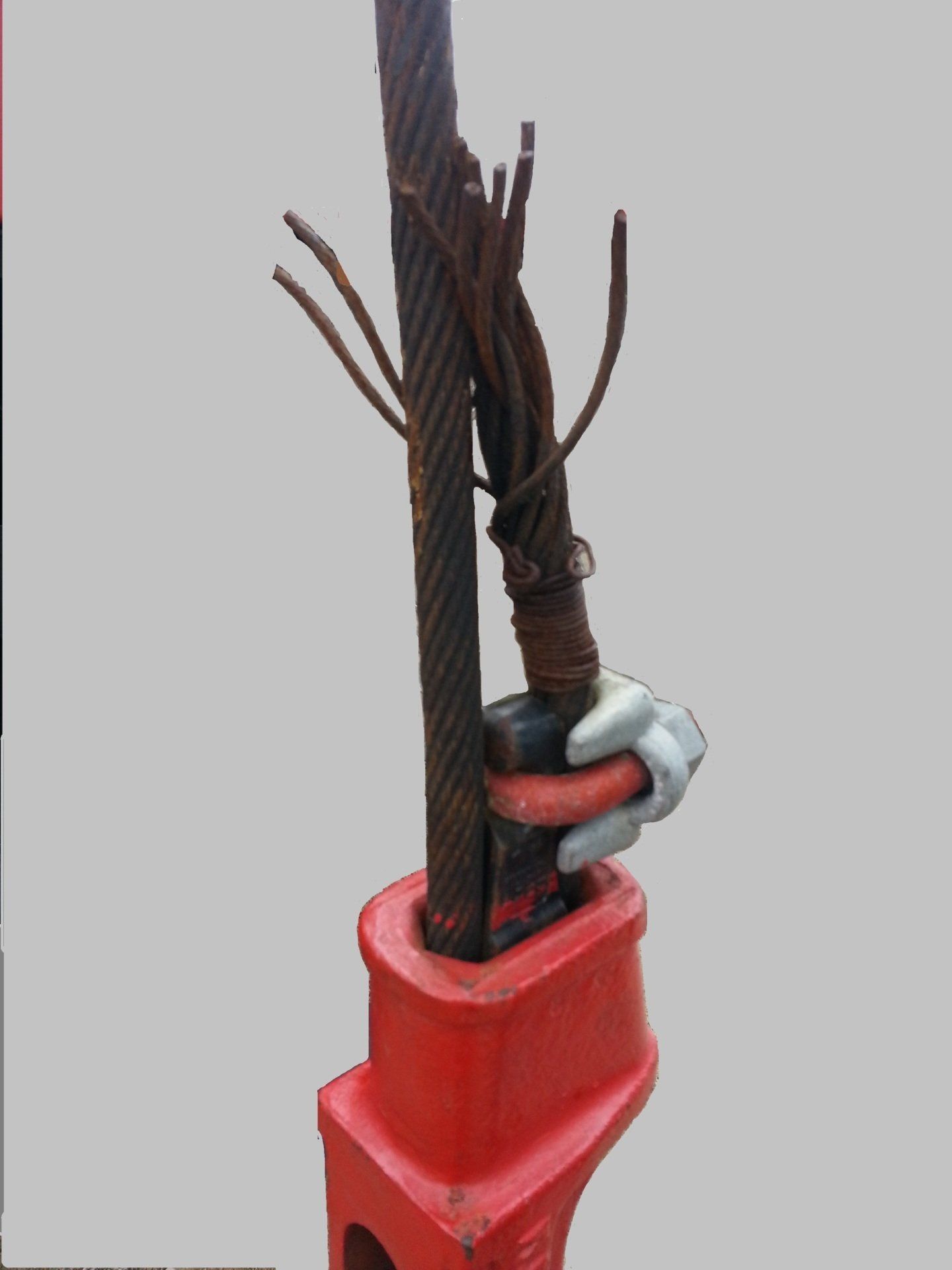 A red object with a rope coming out of it