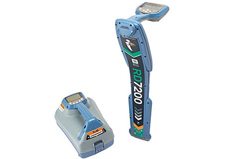 Blue electric shaver and charging dock on white background