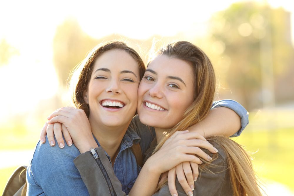 Portrait of a Happy Smiling Teenage Girl with Dental Braces and Glasses — Dental Clinic in Buderim, QLD