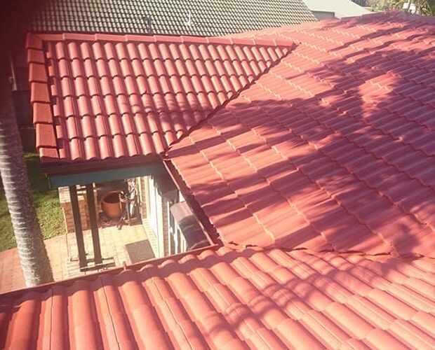 Red Painted Roof — Roof Restoration in Dundowran, QLD