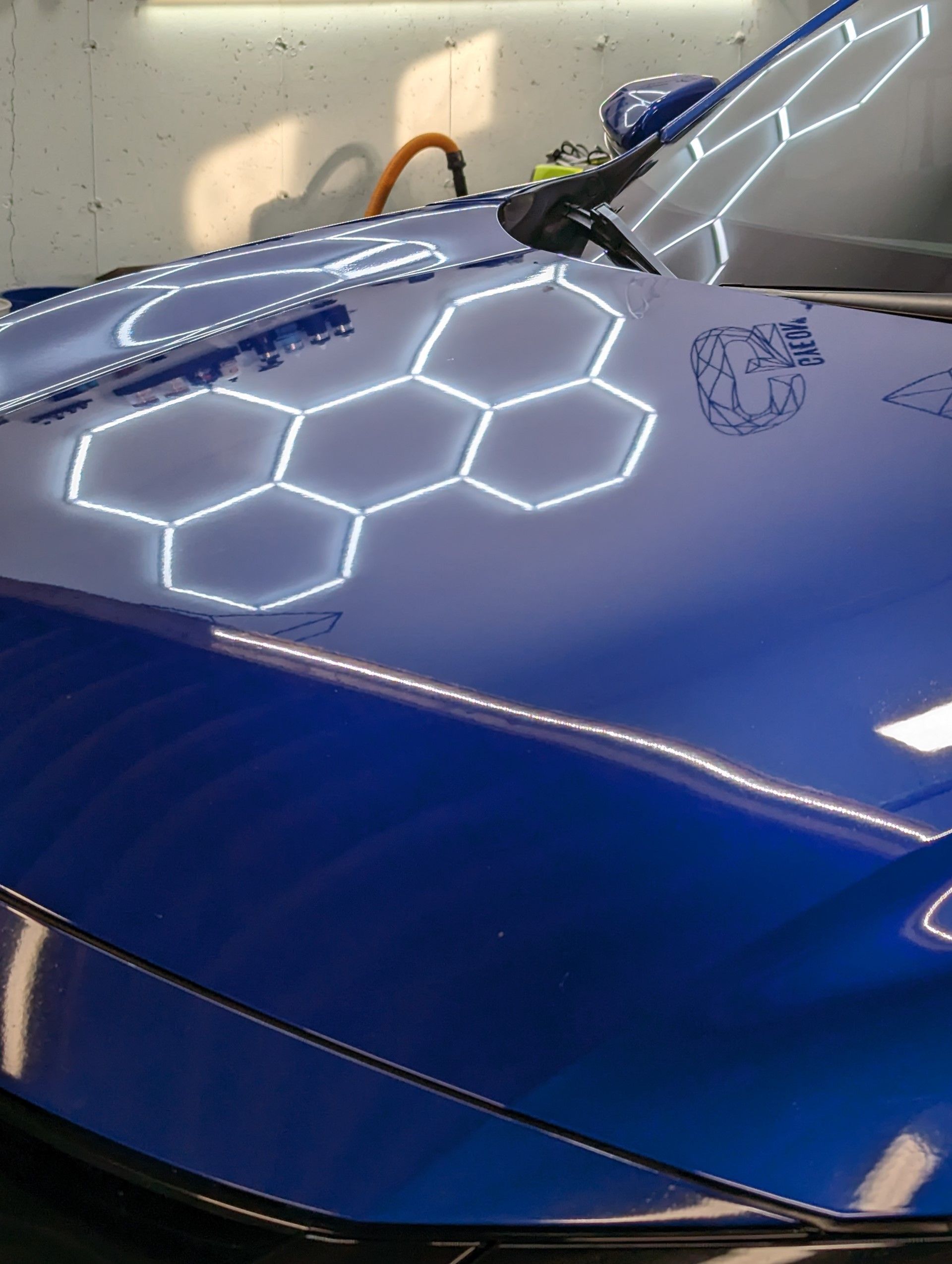 Full Detailing - A blue car after detailing