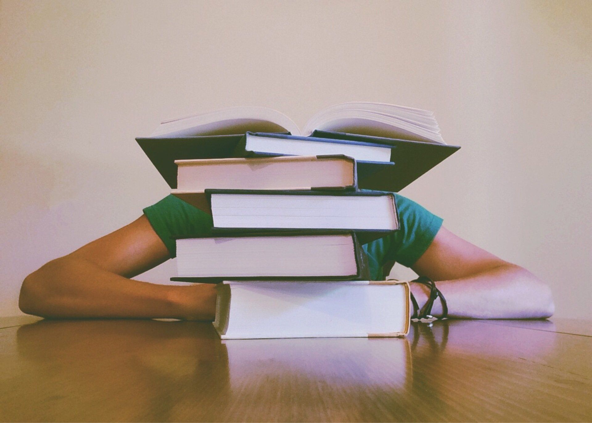 A stack of books, representing the topic of student loan modification.