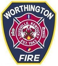Worthington Fire Department badge, dark blue with yellow border, Louisville, Kentucky, red cross symbol, and text 