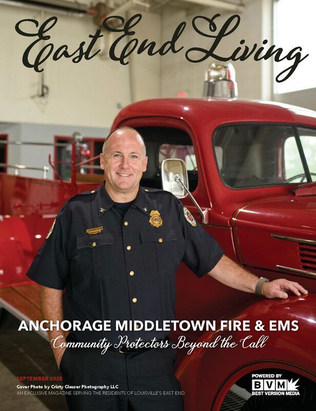 Man in uniform by red fire truck, 