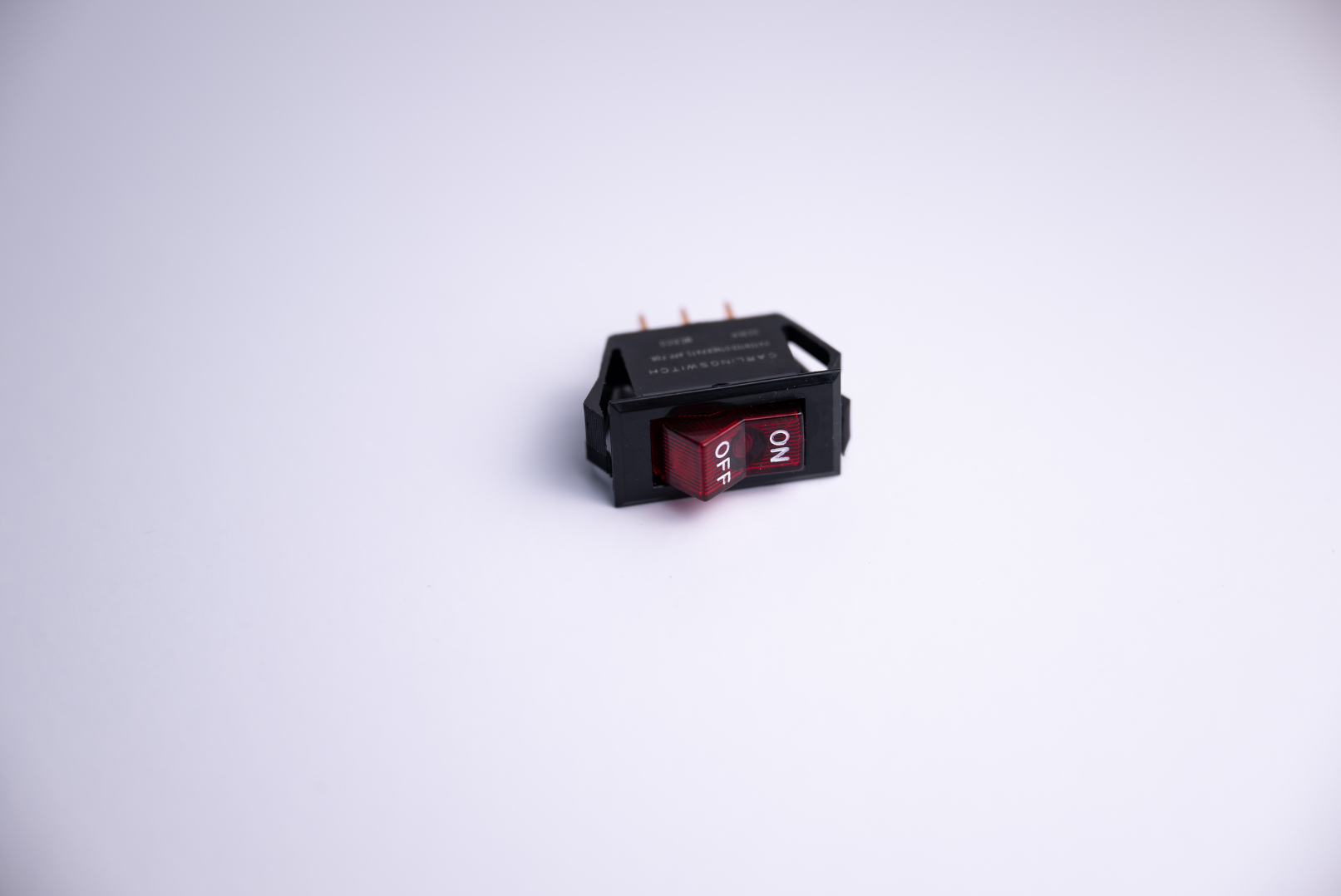 Red and black rocker switch with