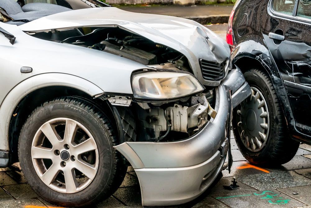 A Silver Car Has Been Damaged In A Car Accident — Gympie/Childers Towing Pty Ltd in Kingaroy, QLD