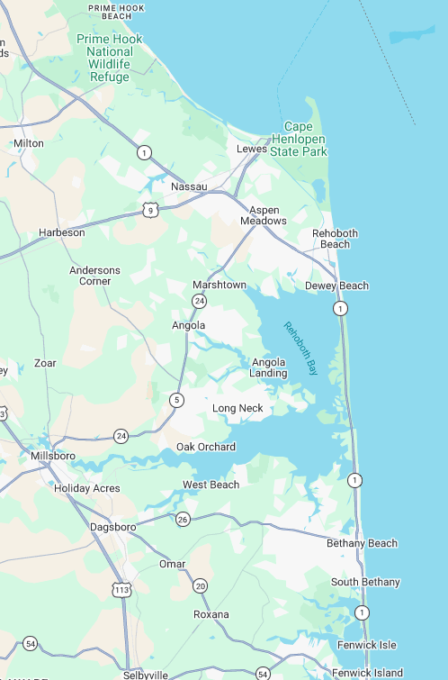 Map of a coastal area with towns, roads, and water on the right side.