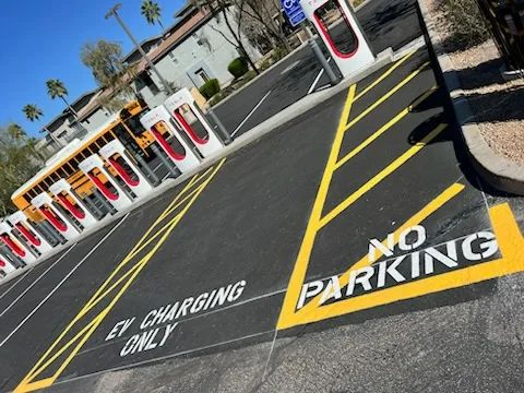 A parking lot with a sign that says no parking