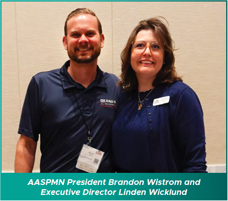 AASPMN President Brandon Wistrom and Executive Director Linden Wicklund smiling at an event