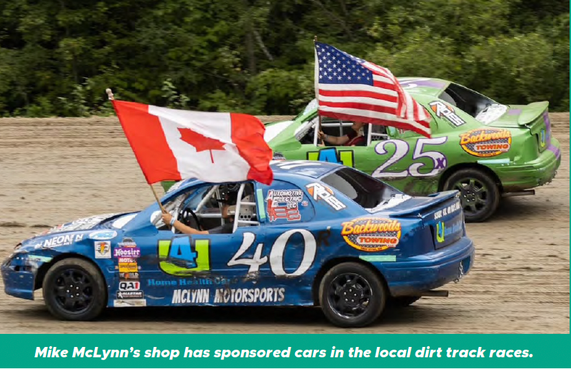 Two stock cars with Canadian and U.S. flags racing on a dirt track, with sponsor text below.