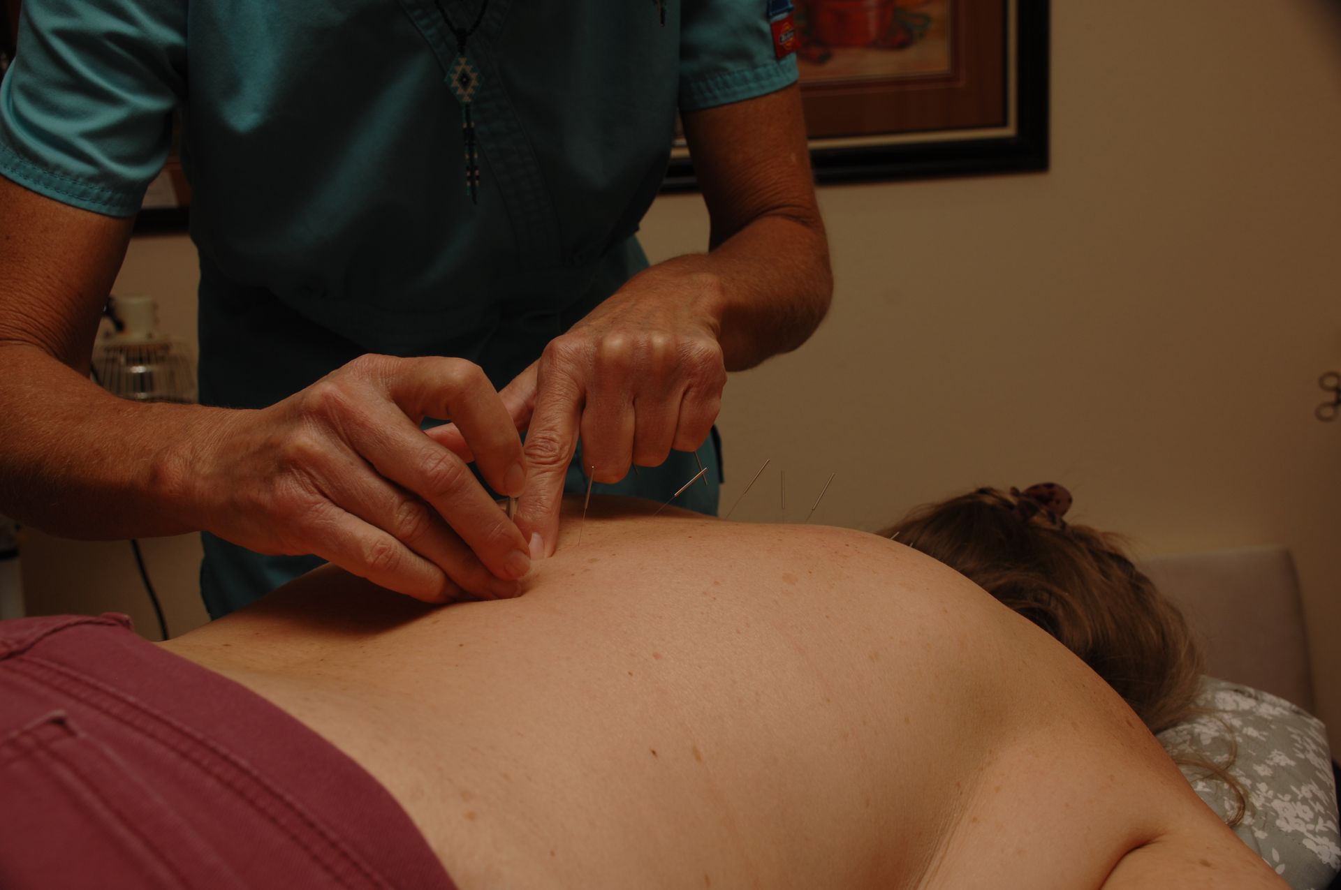 A woman is getting a massage at a spa.