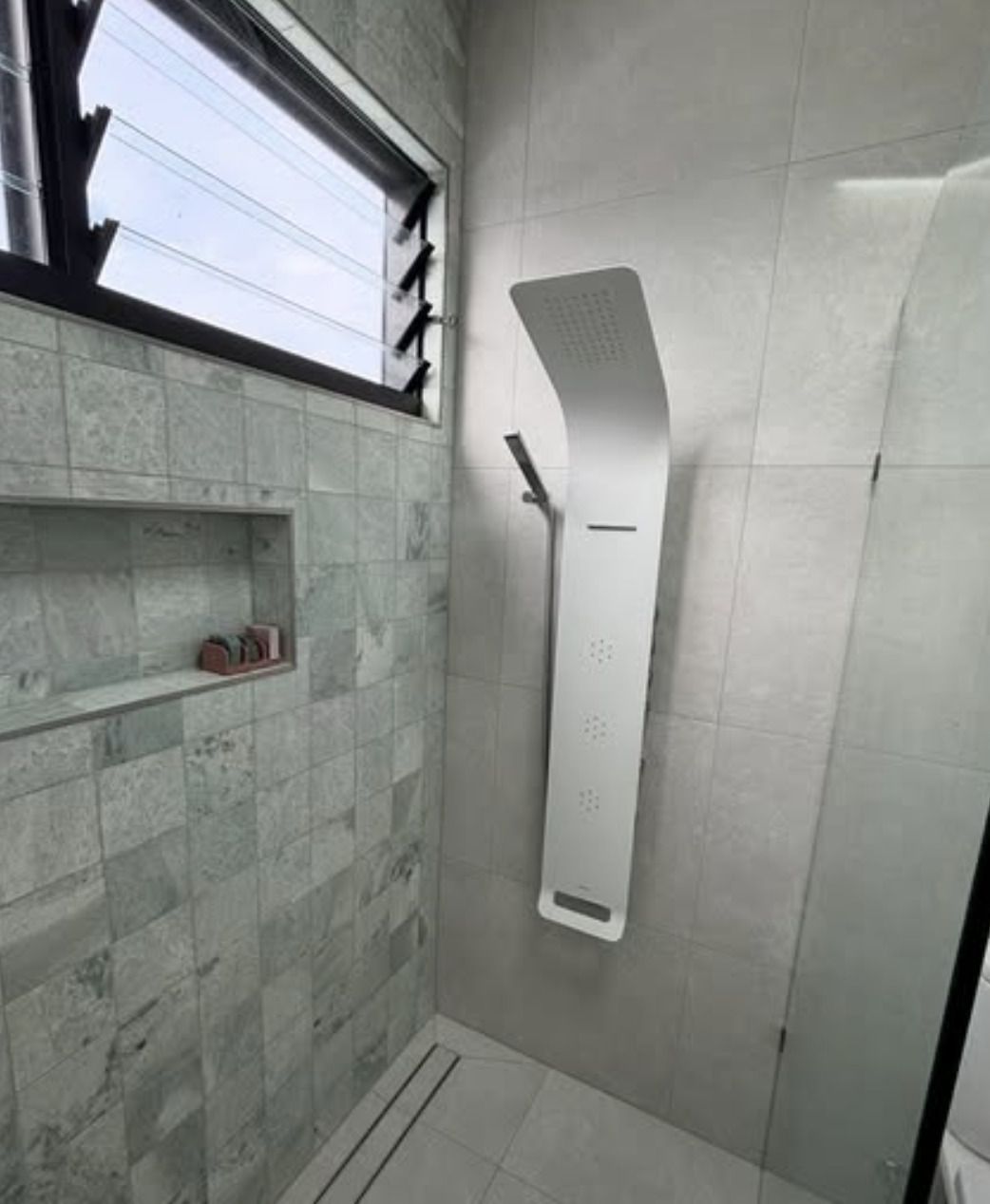 A Bathroom With a Shower and a Window — Shawline Plumbing and Drainage In Grafton, NSW