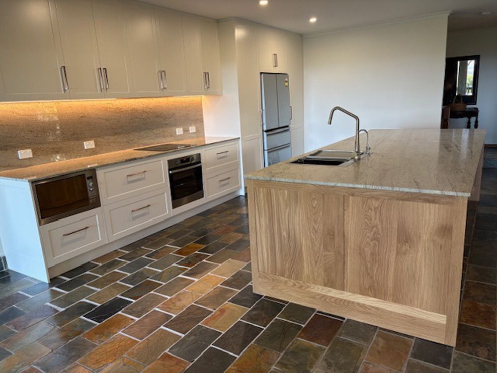 Custom kitchen cabinets with island bench and under-mount sink – Simonetto's Cabinets & Joinery Sunshine Coast