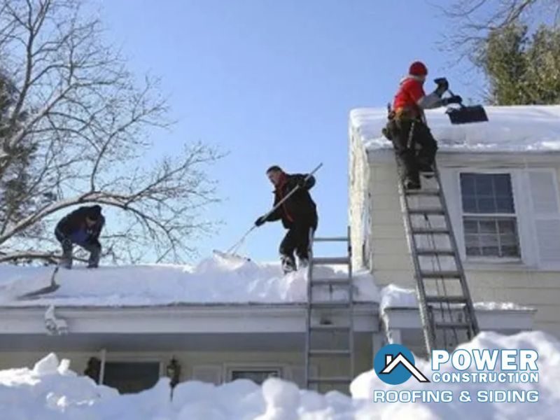 A power construction logo can be seen on the roof of a house