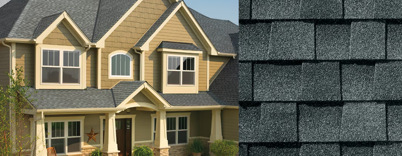 A house with a gray roof and tan siding. Close-up of roof shingles.