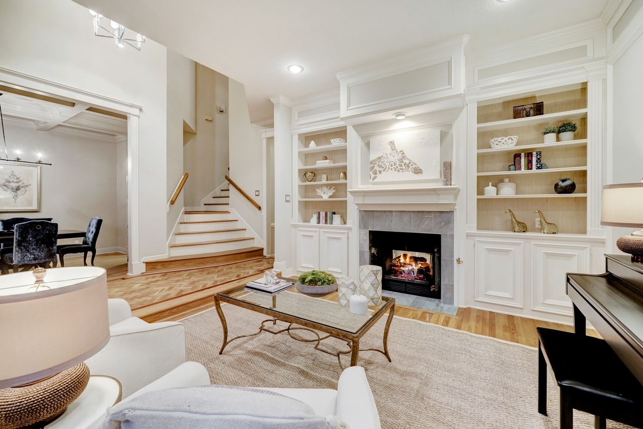 White room w/ wooden floors