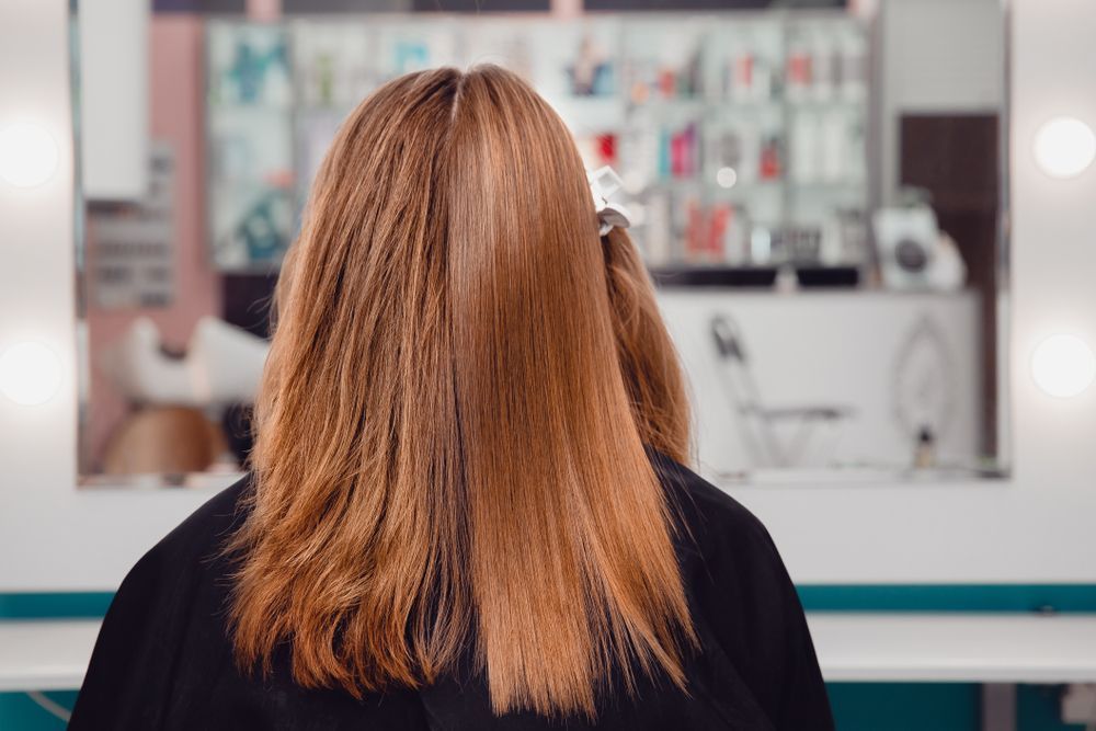 Woman in a Salon Chair — Southside Hair & Beauty Design In South Tamworth, NSW