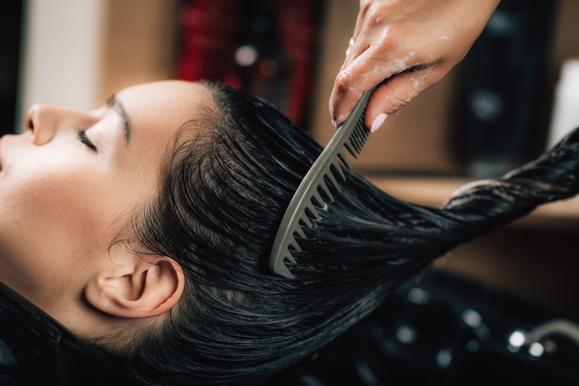 Person Having Hair Combed, Presumably at a Salon — Southside Hair & Beauty Design In South Tamworth, NSW