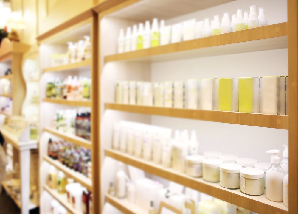 Shelves Filled With Various Cosmetic Products — Southside Hair & Beauty Design In South Tamworth, NSW