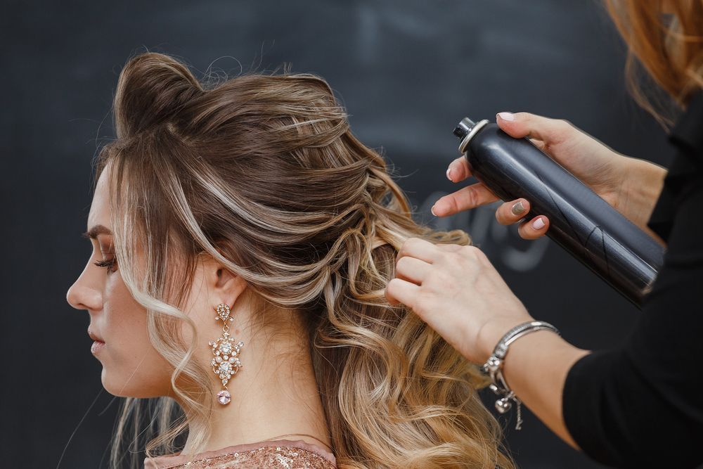 Woman Getting Hair Styled With Hairspray — Southside Hair & Beauty Design In South Tamworth, NSW