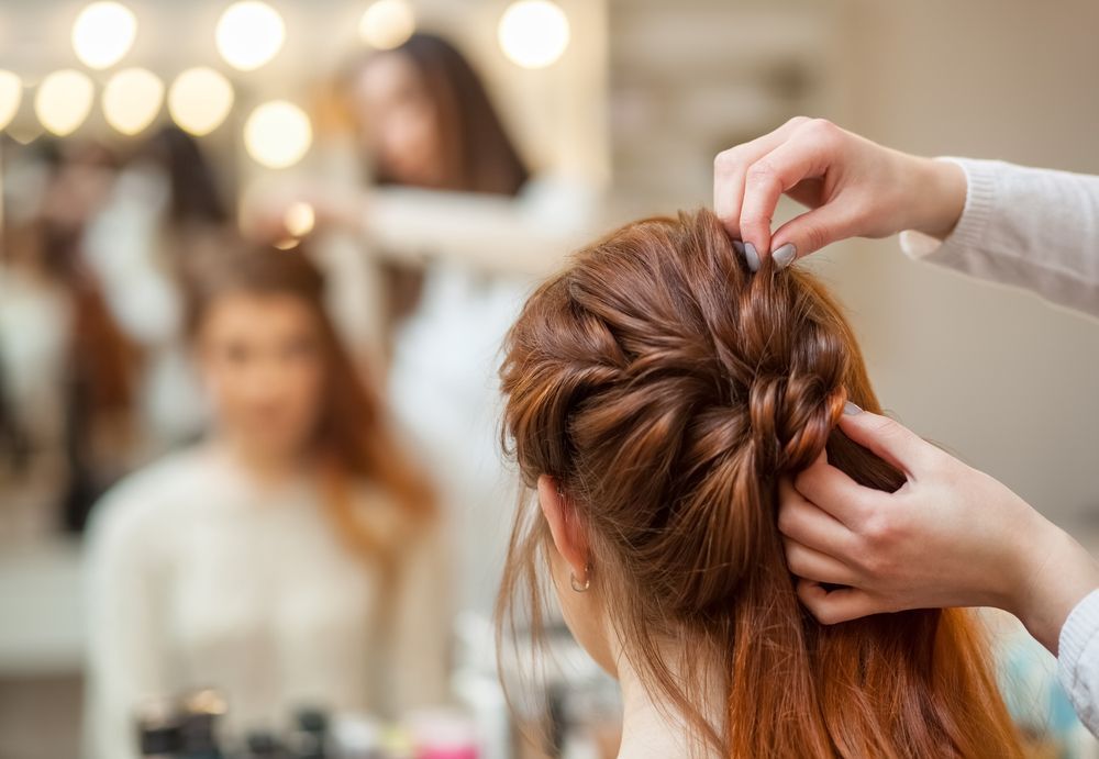 Hands Styling Red Hair in a Salon — Southside Hair & Beauty Design In South Tamworth, NSW