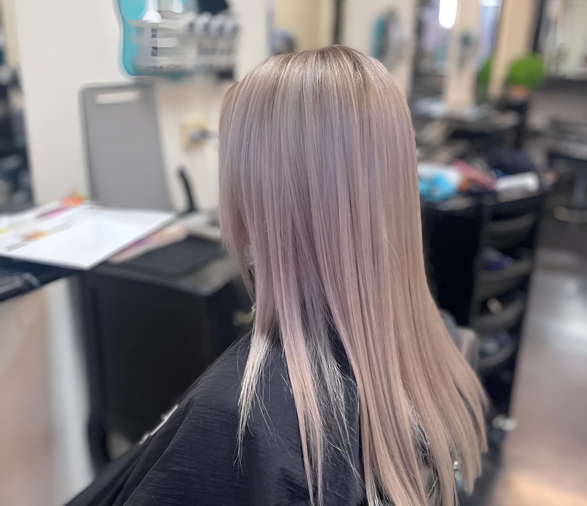 A Woman With Long Blonde Hair — Southside Hair & Beauty Design In South Tamworth, NSW