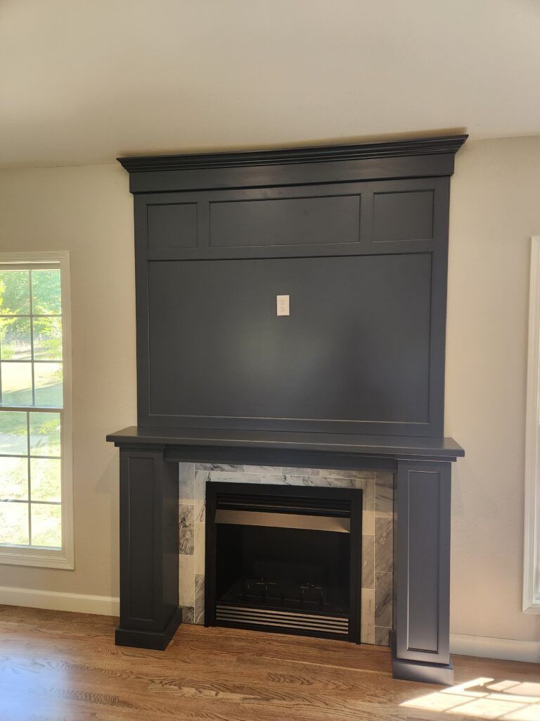 There is a fireplace in the middle of the room.