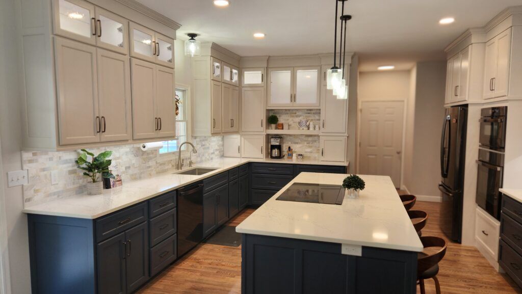 A kitchen with a large island in the middle of it.