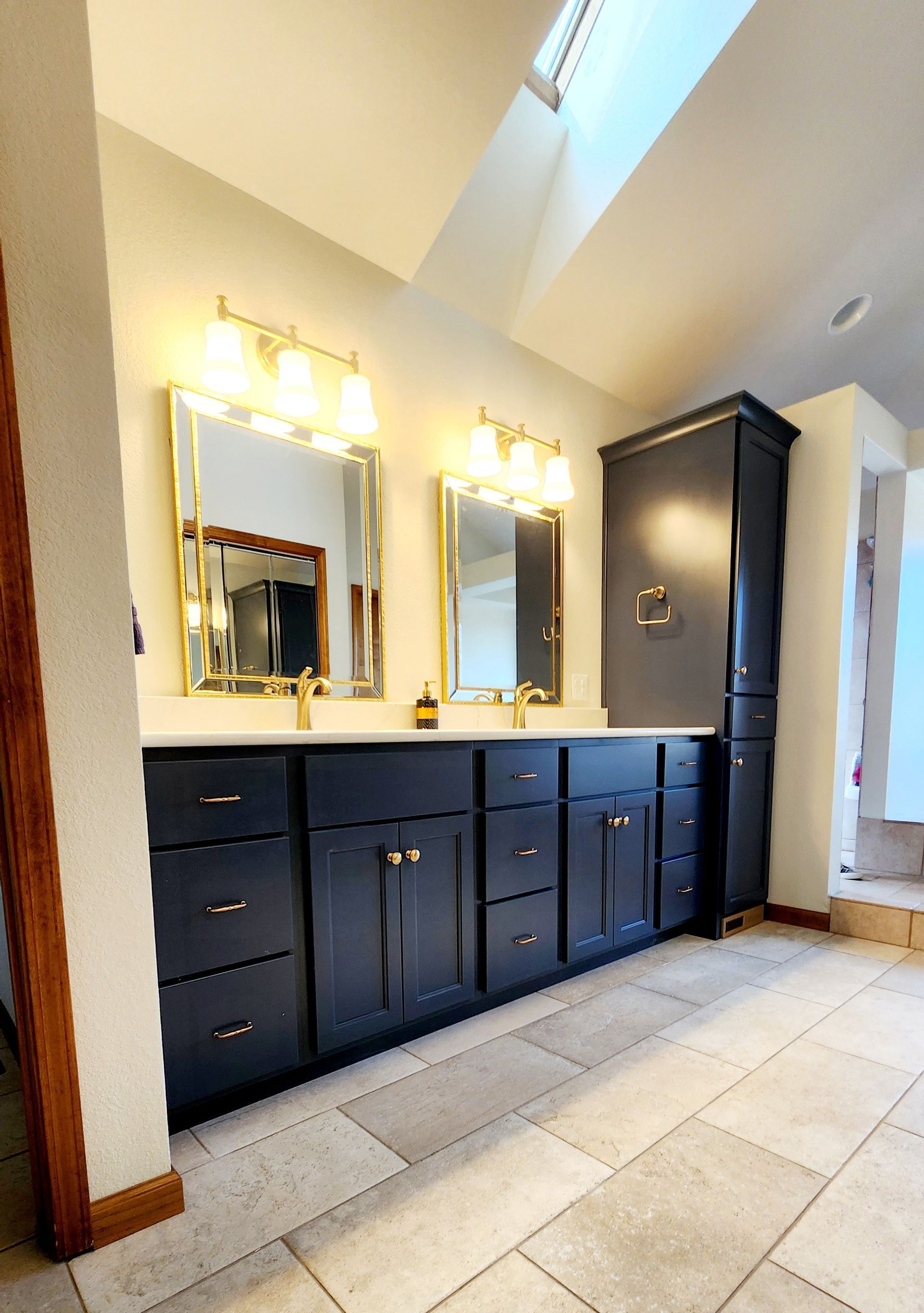 A bathroom with a walk in shower and a bathtub.