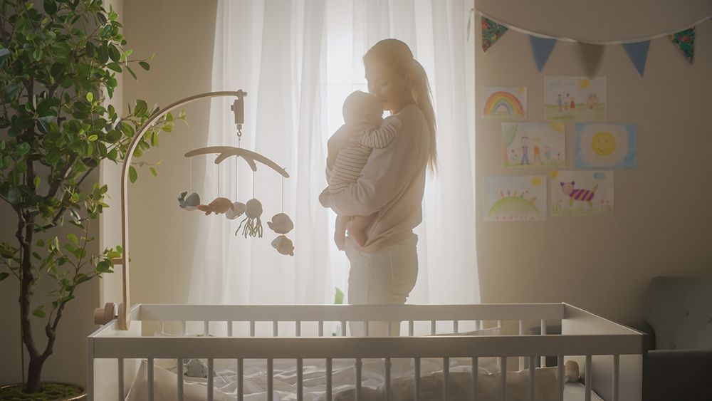 Caring Mom and Neonate Toddler