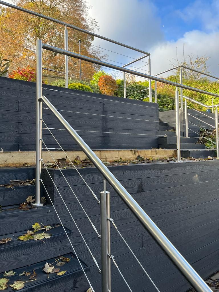 Composite Gates UK multi level composite decking with stainless steel balustrades