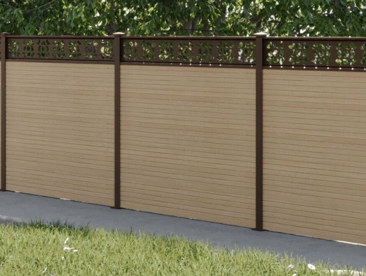 Composite Gates UK light grey decorative trellis on top of natural timber composite fencing 
Coventry