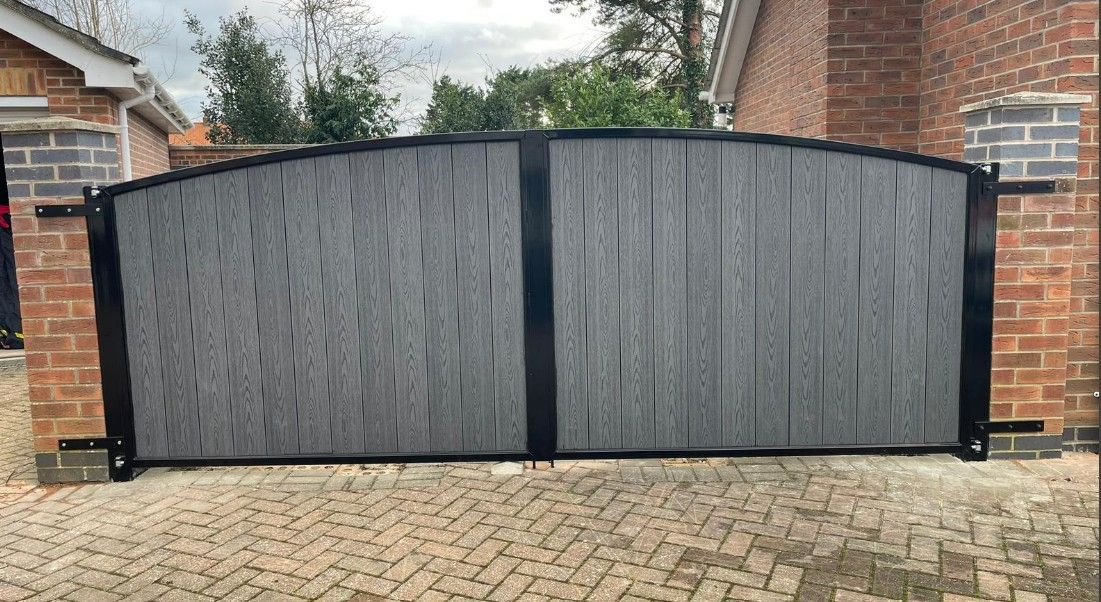 Grey arched composite driveway gates in Glasgow