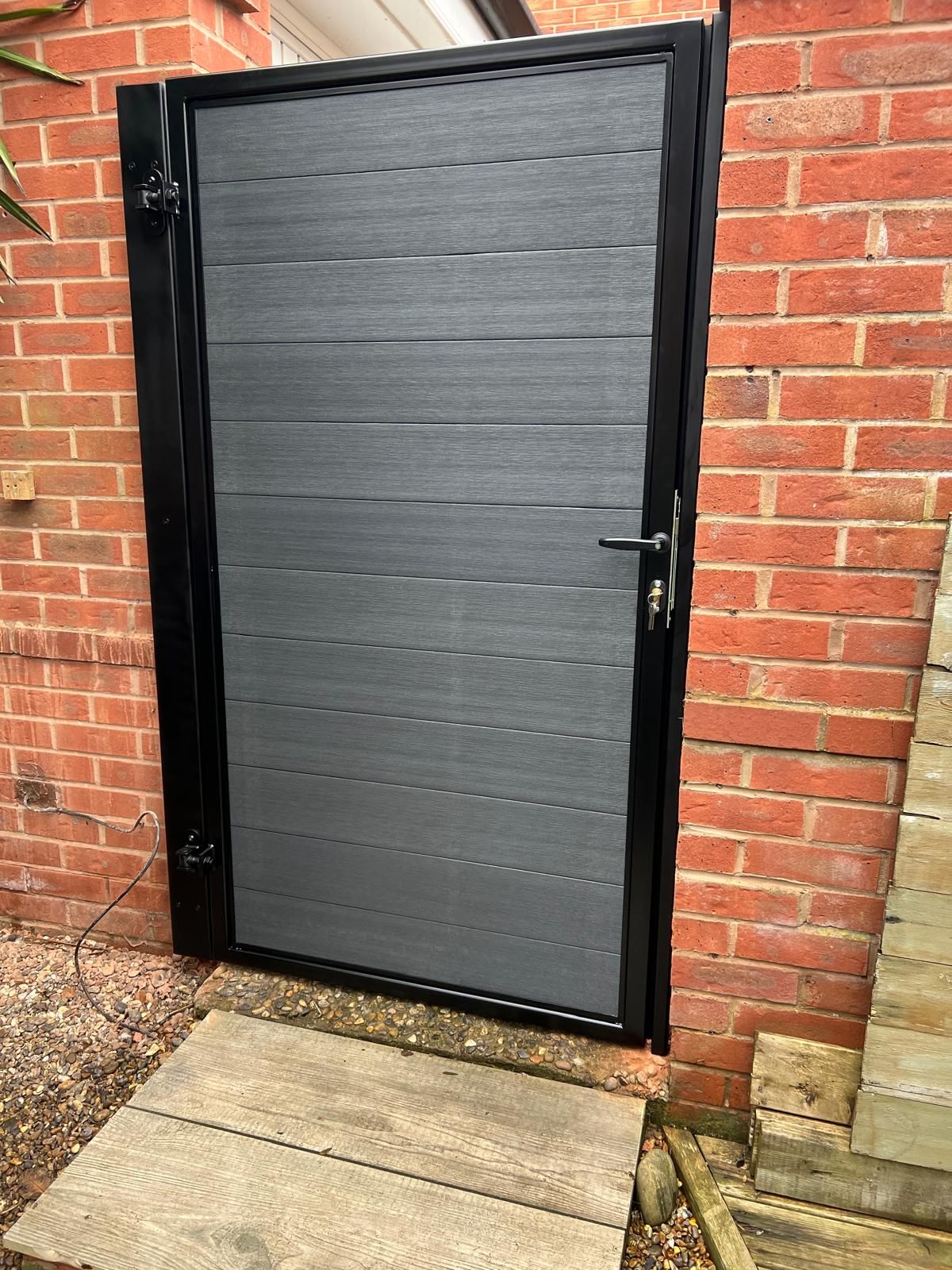 grey composite pedestrian gate with horizonal panels