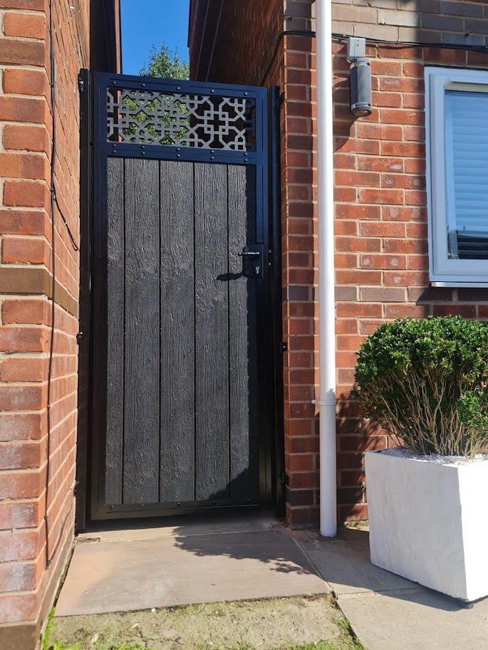 grey composite garden gate with screen topper in Huddersfield