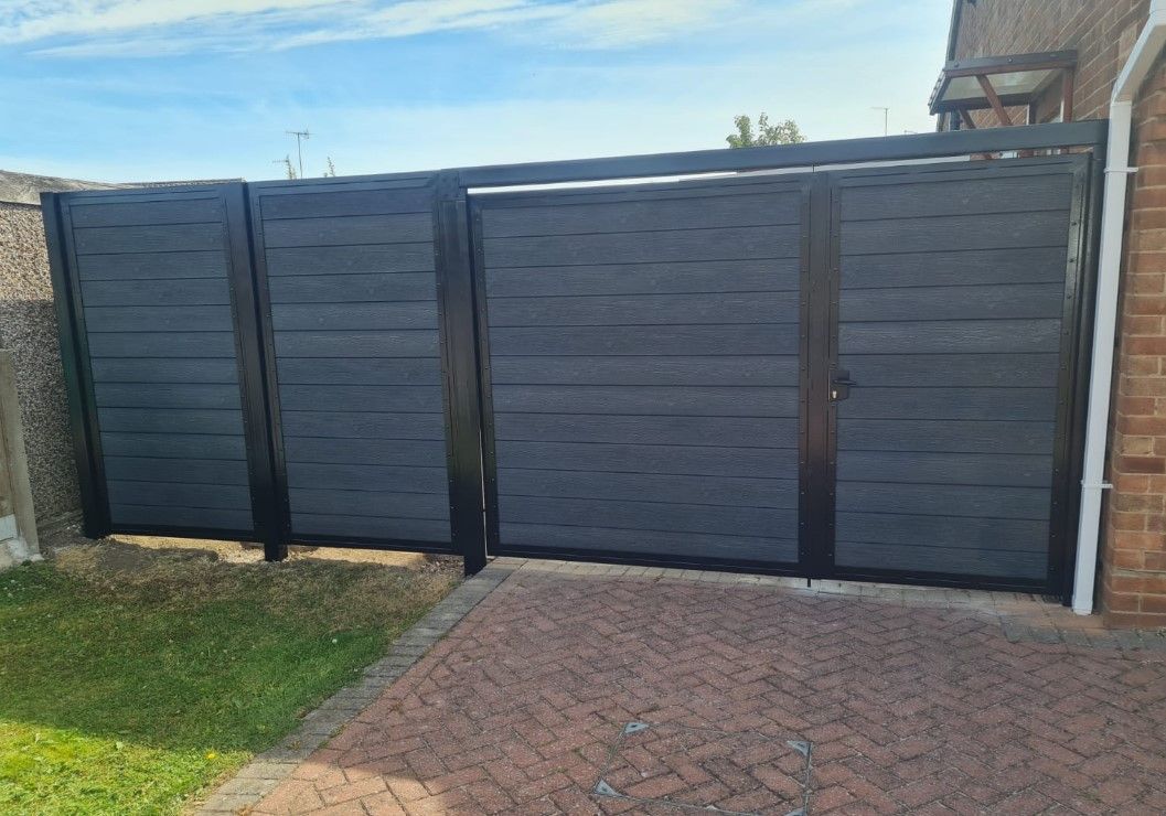bespoke double anthracite grey composite gates with matching composite fencing
