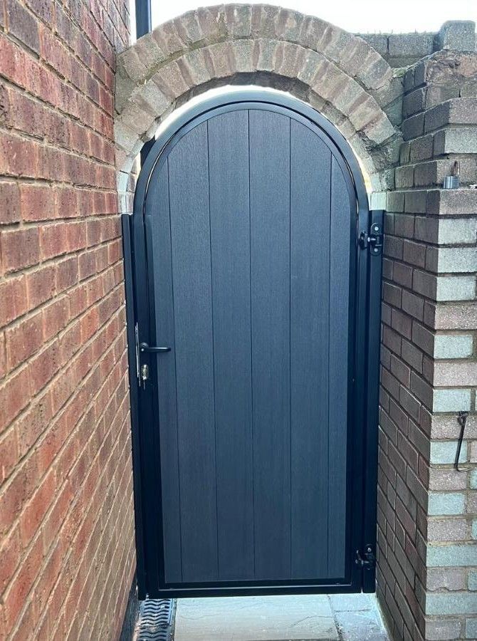 grey composite arched side gate in Cheltenham