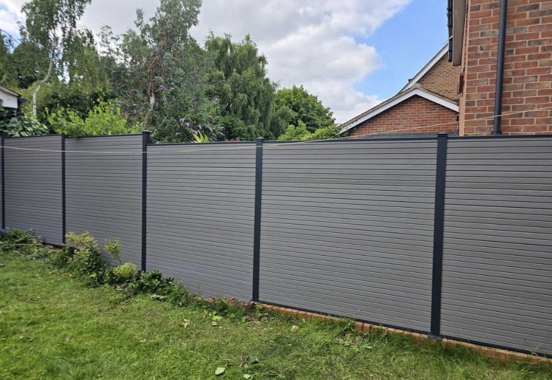 Composite Gates UK light grey composite panel fence with black fence posts in Stoke on Trent