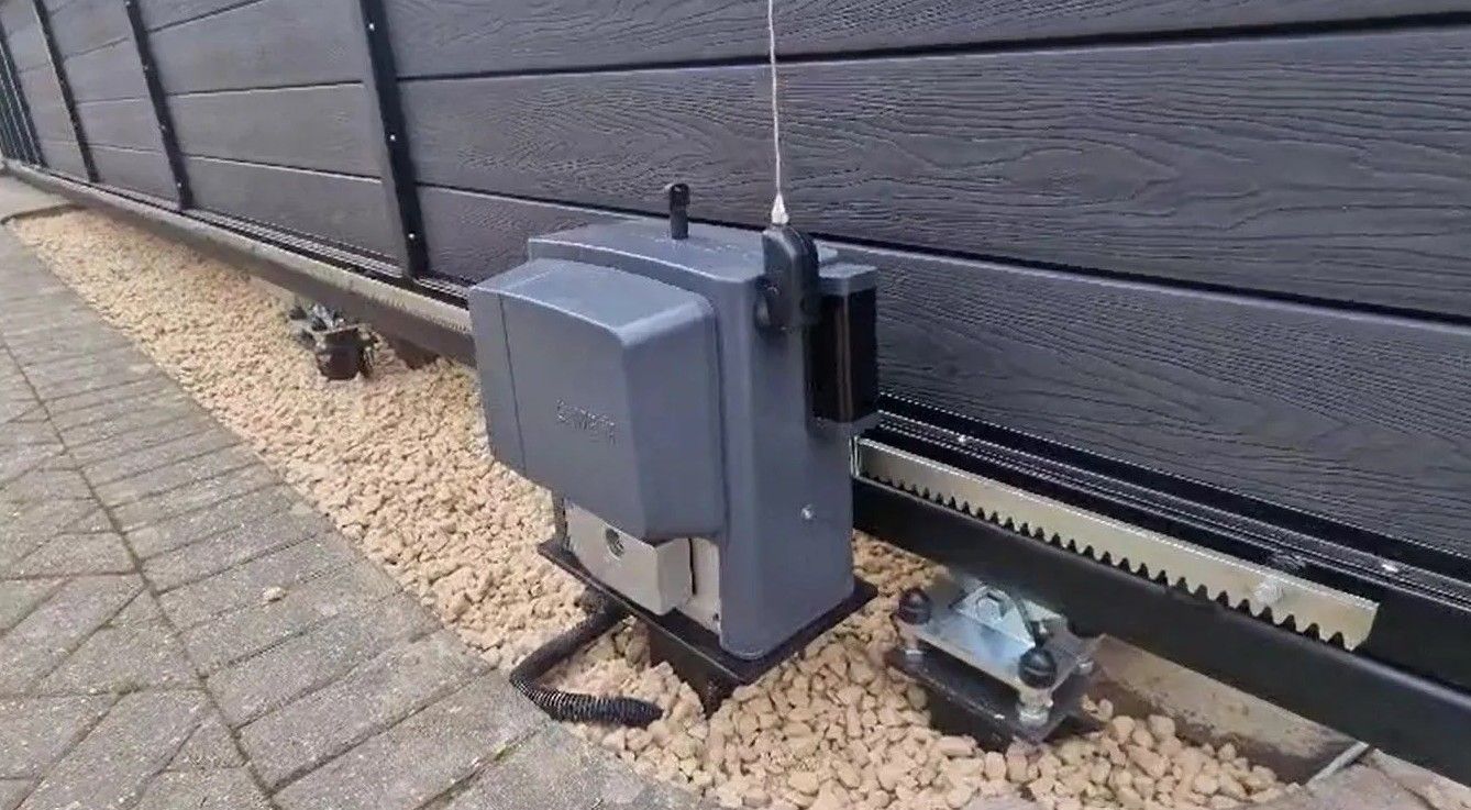 Installed electric sliding gate motor for composite sliding gate in South London