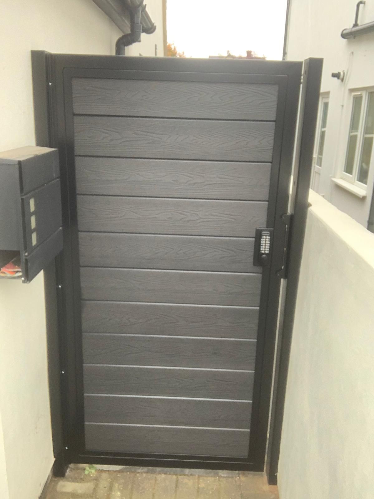 grey composite side gate with horizonal panels
