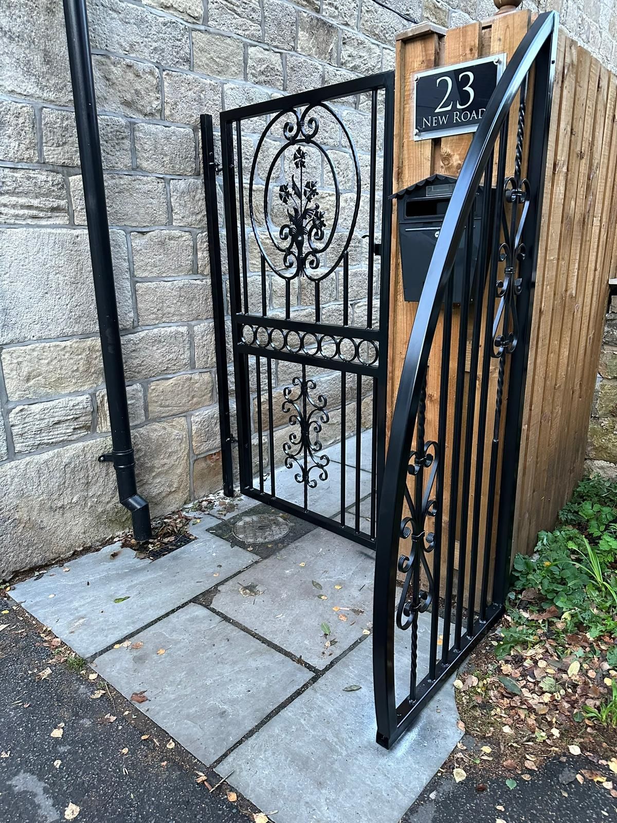 Metal garden gate and side screen in Widnes