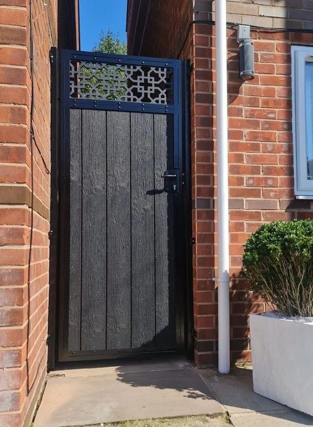 grey composite garden gate with screen topper in South London
