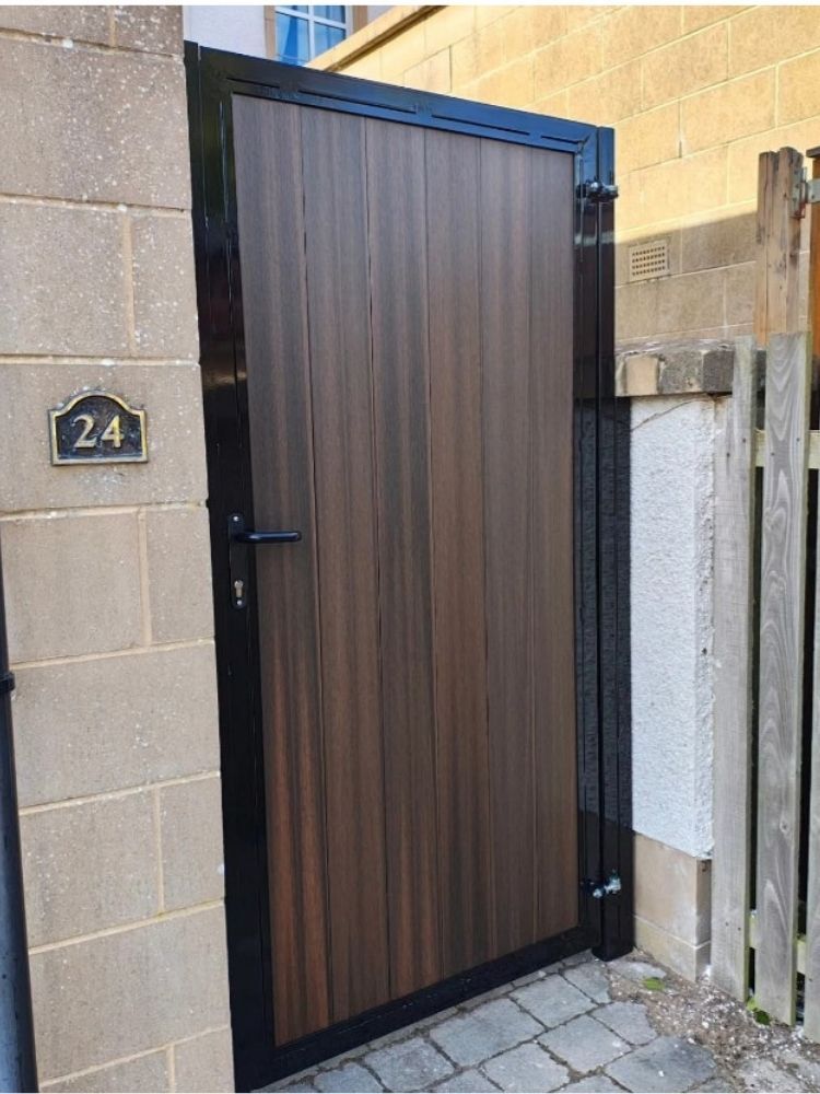 Walnut composite side gate with a black powder-coated frame