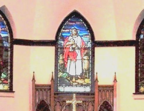interior of church, altar, stain glass of Jesus
