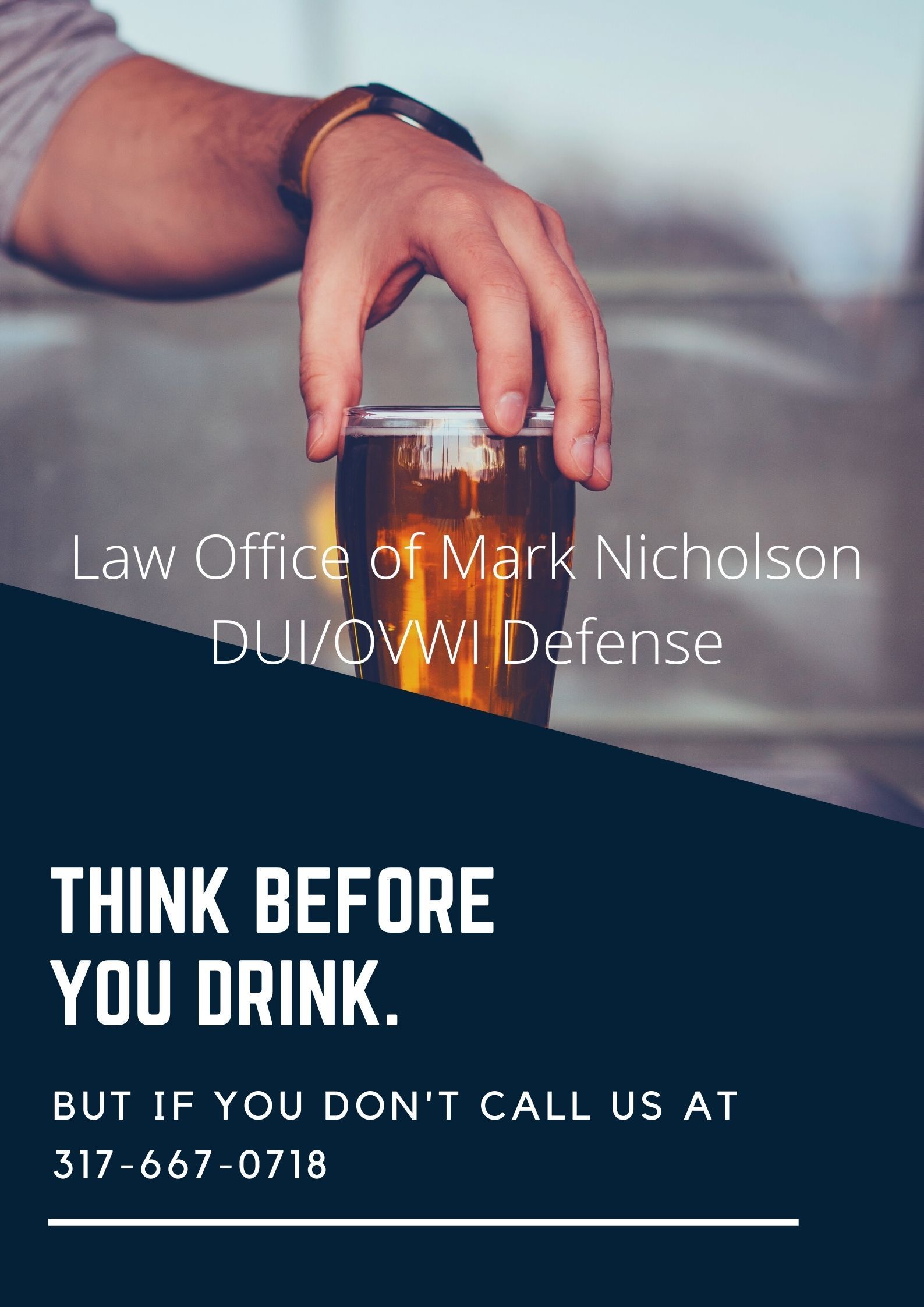 Hand over glass of beer