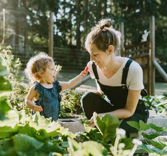 Mother with her child in the garden Mother with her child in the garden