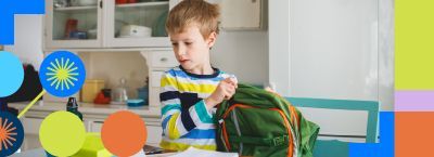 50.00 per month for Turbo Internet Child packing a green backpack in a bright classroom with colorful decorations.