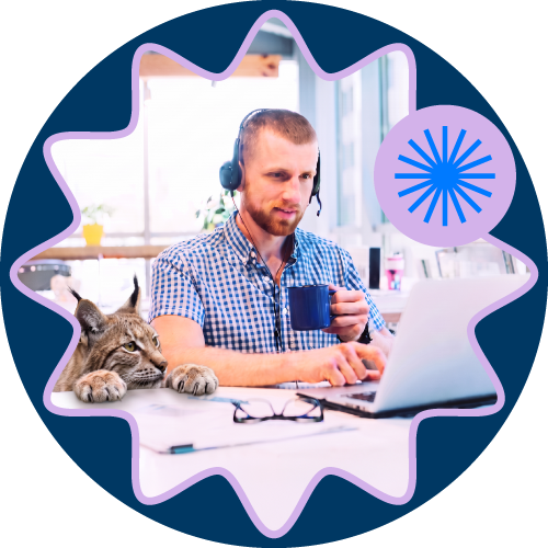 Extreme Internet for Your Business Man at a desk with headset, mug, and cat beside a laptop in a bright home office.