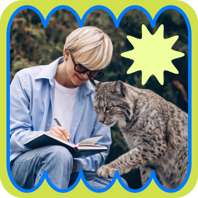 Person writes in a notebook beside a tabby cat, framed by a bright yellow-blue border.