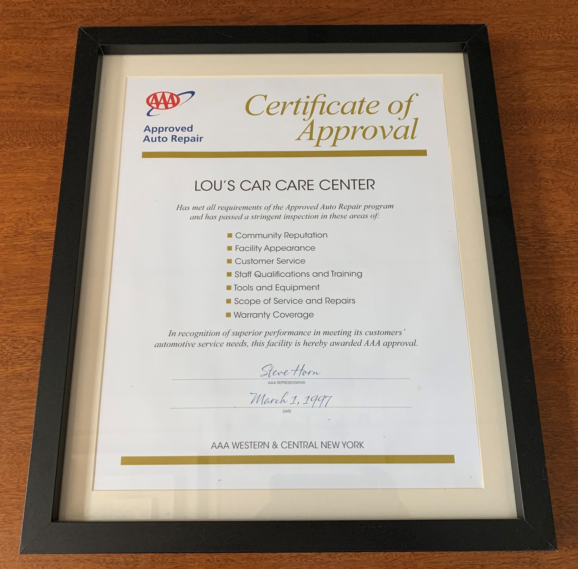 A certificate of approval from lou 's car care center | Lou's Car Care Center, Inc.